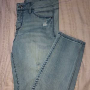 Light blue ripped jeans